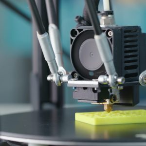 3D Printing Machine printing a piece of plastic